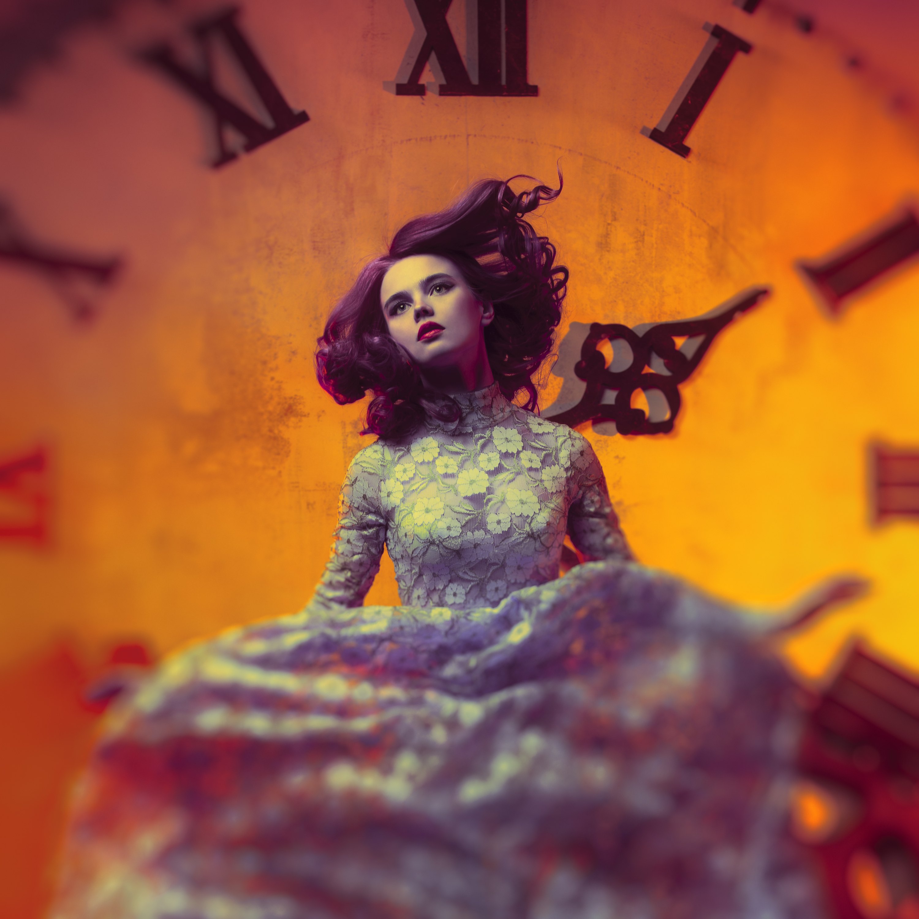 Young woman on clock background.