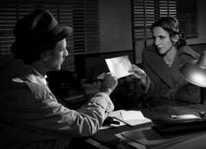 Woman Handing Over An Envelope To A Detective