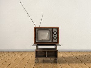 Vintage Tv on top of a table in a clean room